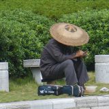 Chinesischer Fischer bei der Arbeit
