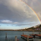 Regenbogen über der Langebaan-Lagune
