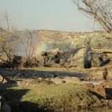 Himba Kinder beim Baden im Kunene River
